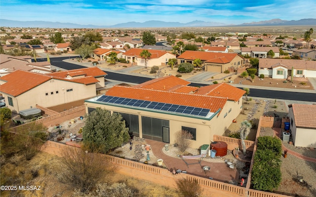 4836 S Desert Sunset Dr, Green Valley, AZ 85622 - aerial view of residential area featuring a mountain backdrop