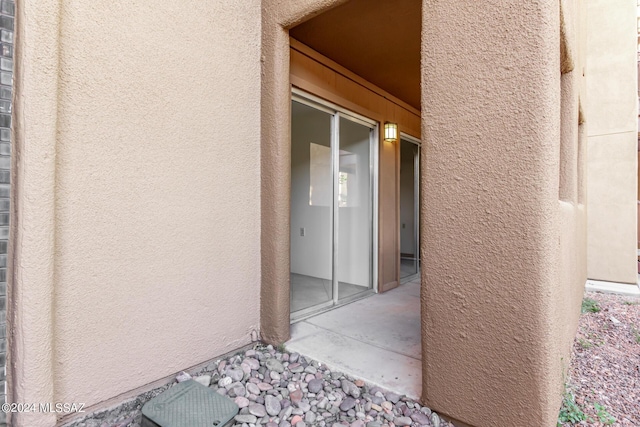 doorway to property featuring a patio