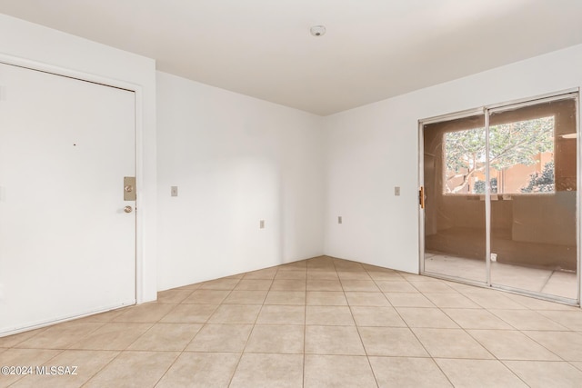 view of tiled spare room