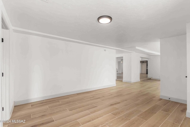 unfurnished room featuring light hardwood / wood-style flooring