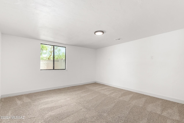 spare room with carpet flooring