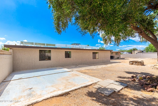 rear view of house featuring a patio area