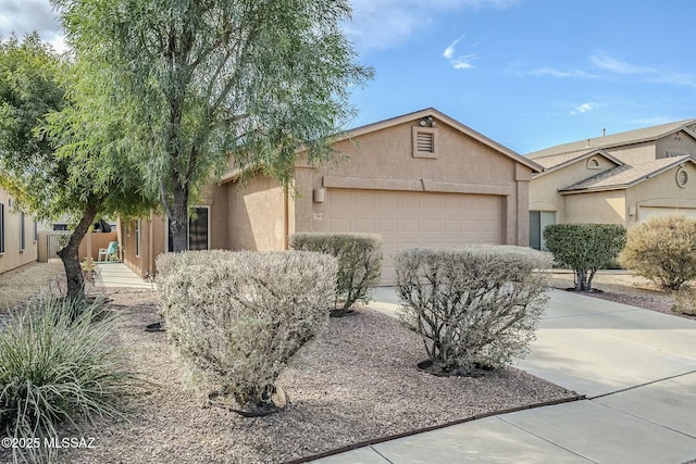 ranch-style home with a garage