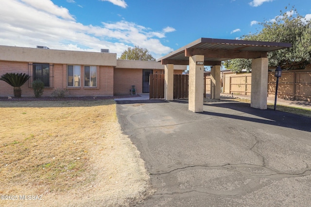 view of front facade with a carport