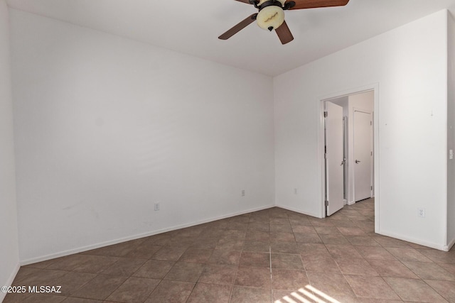 empty room featuring ceiling fan