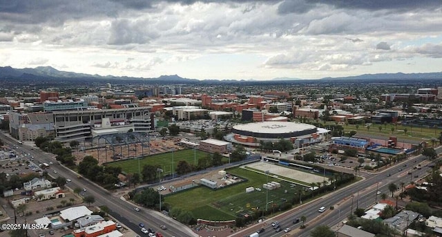 birds eye view of property featuring a mountain view