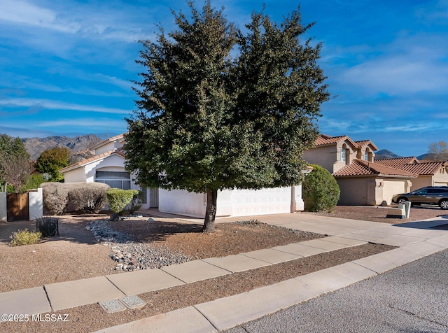 obstructed view of property featuring a mountain view