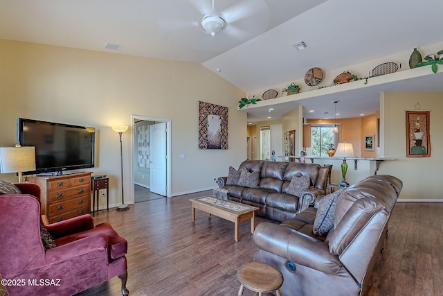 living room with vaulted ceiling, dark wood-type flooring, and ceiling fan