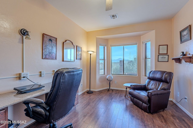 office space with wood-type flooring and ceiling fan