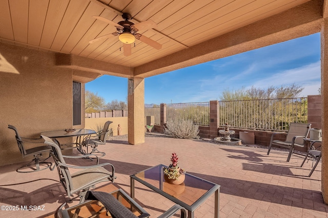 view of patio / terrace featuring ceiling fan