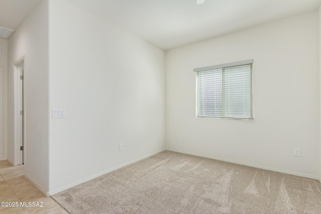 view of carpeted spare room