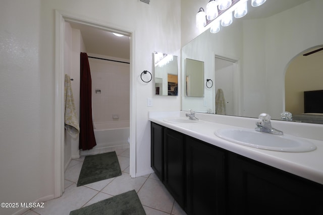 bathroom with vanity, tile patterned floors, and shower / tub combo with curtain