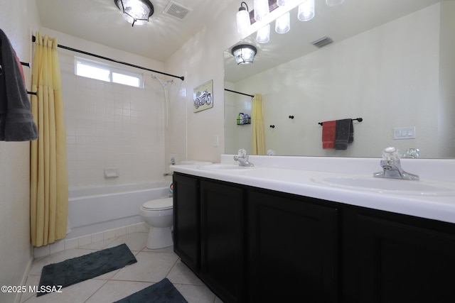 full bathroom featuring vanity, toilet, tile patterned floors, and shower / bath combo with shower curtain