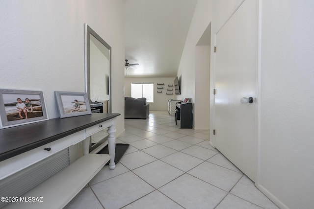 corridor with light tile patterned floors