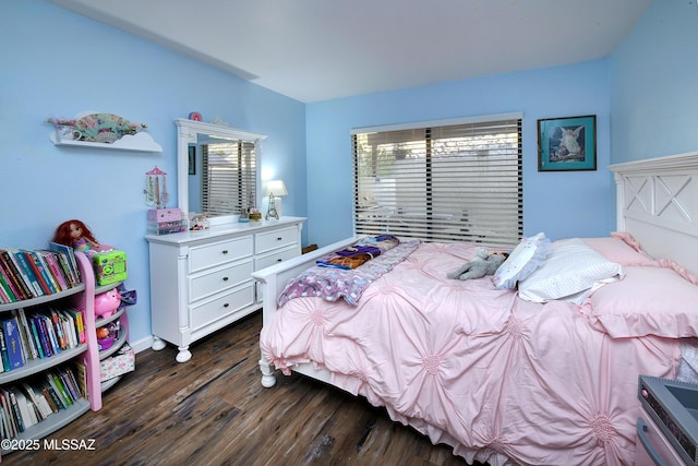 bedroom featuring dark hardwood / wood-style floors