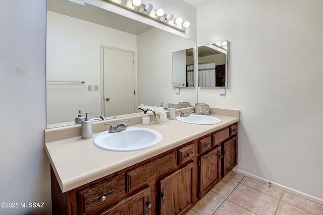 bathroom with tile patterned flooring and vanity