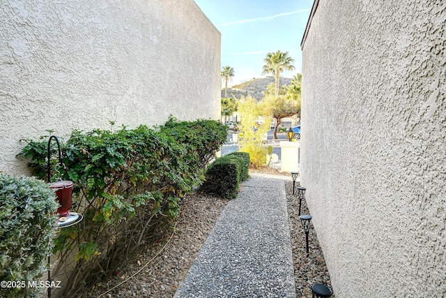 view of side of property featuring a mountain view