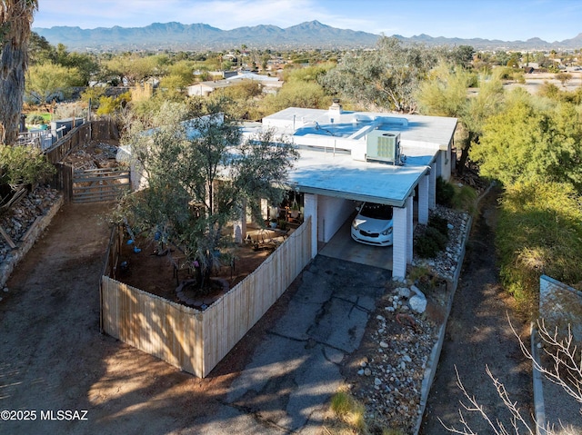 birds eye view of property featuring a mountain view