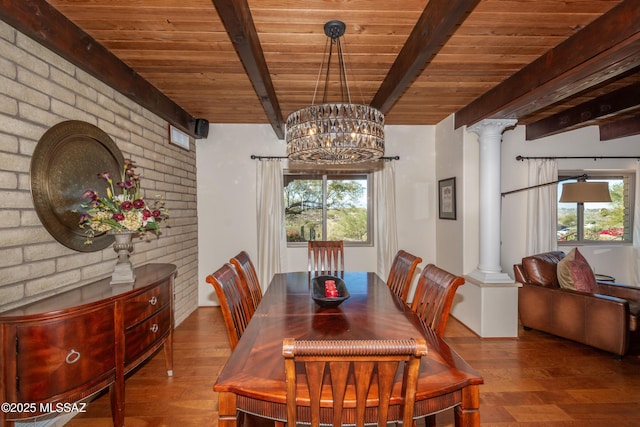 dining space with wooden ceiling, decorative columns, beam ceiling, and wood finished floors