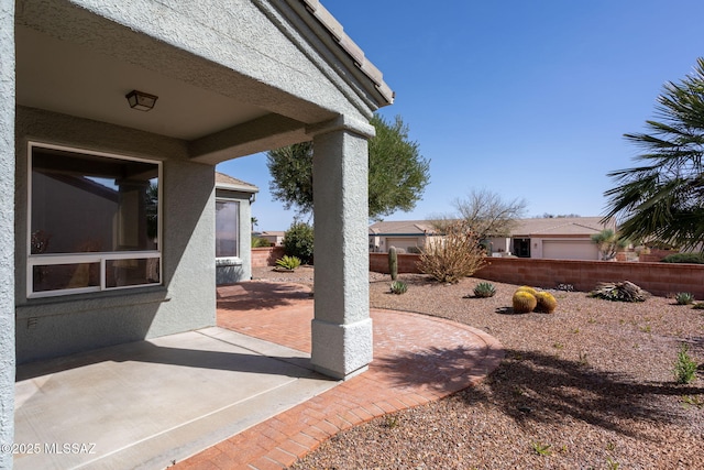 view of yard with a patio and fence