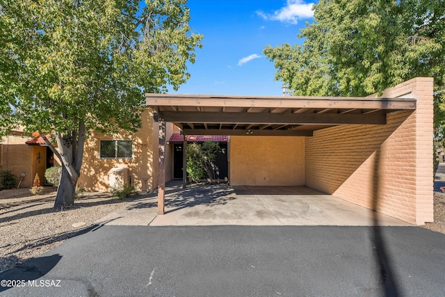 view of car parking featuring a carport