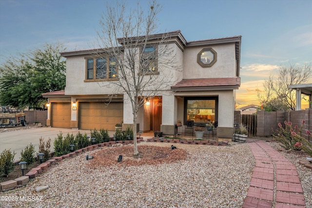 view of front of property featuring a garage