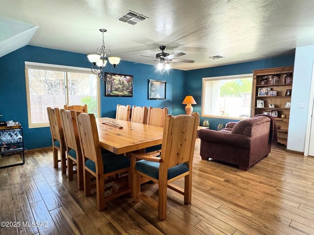 living room with hardwood / wood-style floors and ceiling fan