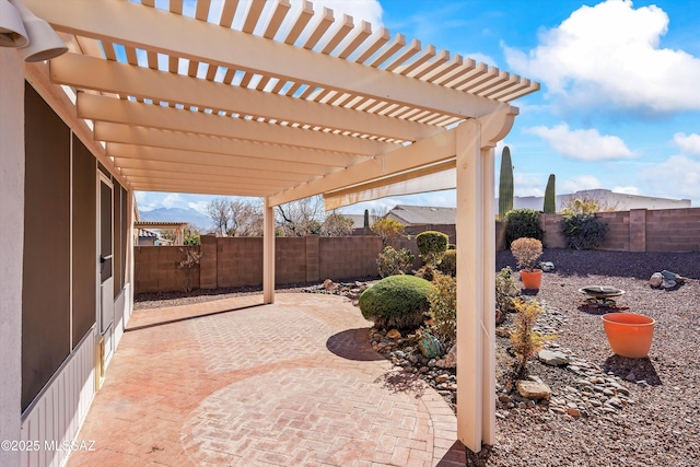 view of patio featuring a pergola