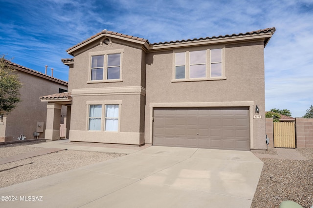 view of front of property featuring a garage