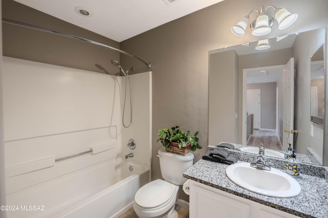 full bathroom featuring shower / bath combination, toilet, and vanity