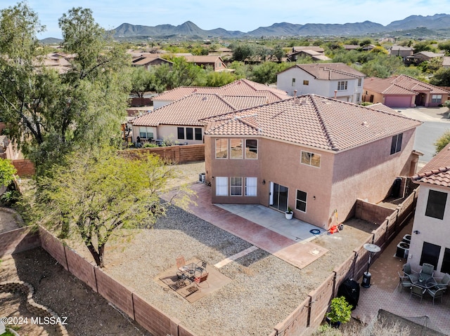 drone / aerial view featuring a mountain view