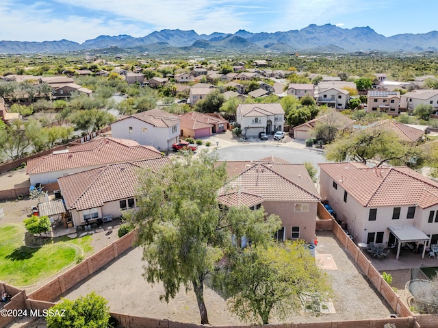 birds eye view of property featuring a mountain view