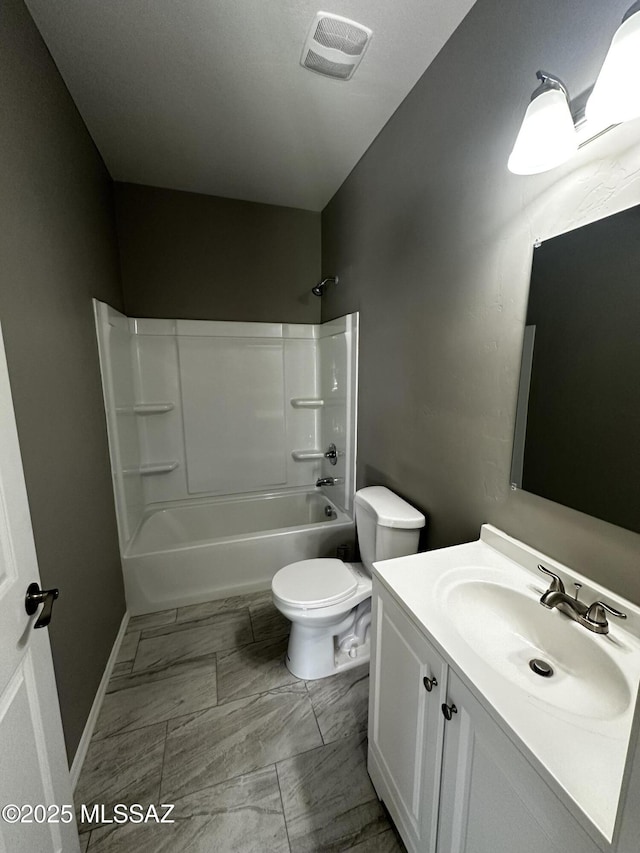 full bathroom with vanity, shower / bathtub combination, and toilet