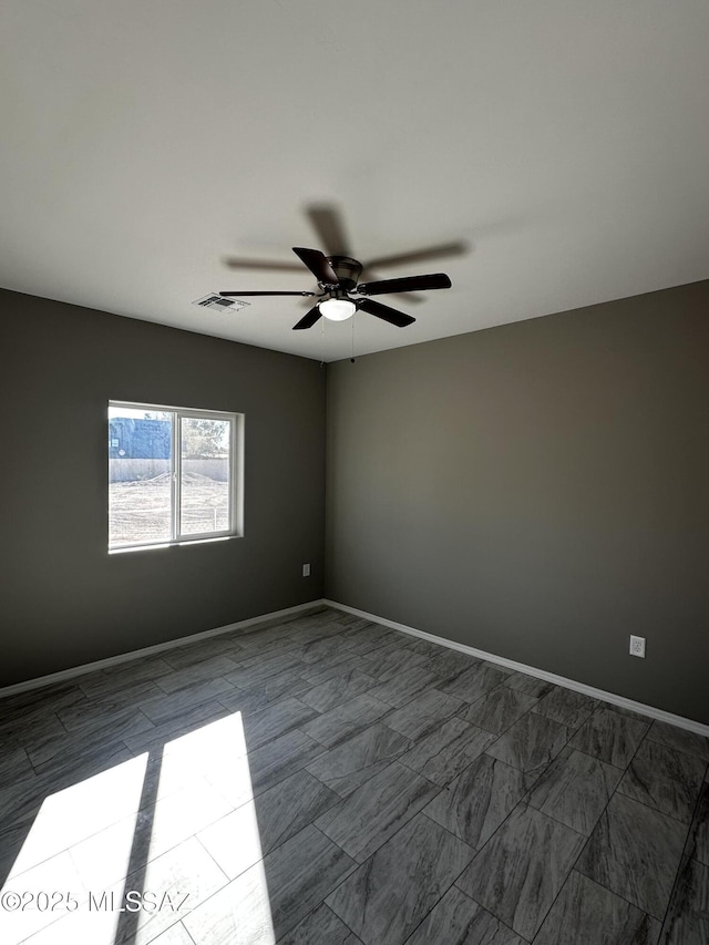 empty room with ceiling fan