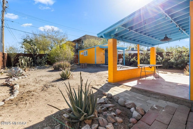 view of patio / terrace featuring an outbuilding