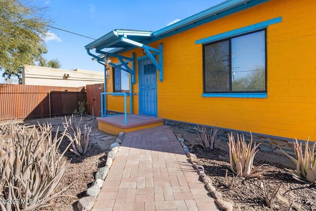 doorway to property with a patio area