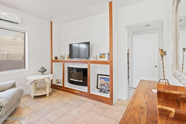 tiled living room featuring a wall unit AC