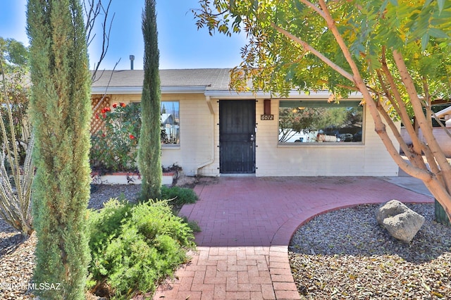 view of front of house with a patio