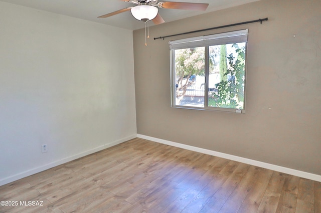 unfurnished room with ceiling fan and light hardwood / wood-style floors