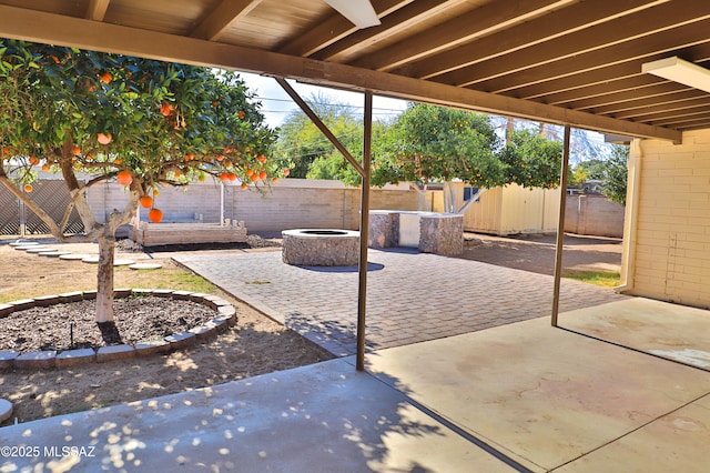 view of patio / terrace with a fire pit