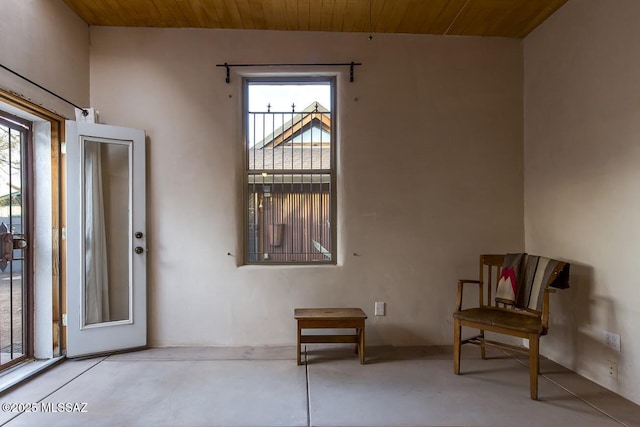 sitting room featuring wooden ceiling