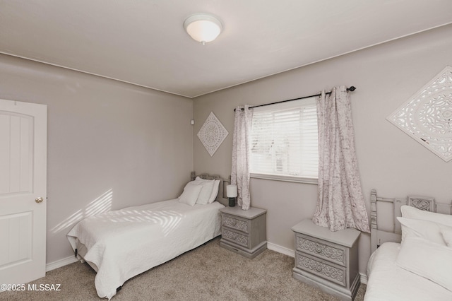 bedroom featuring light colored carpet