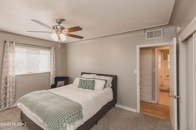 bedroom with ceiling fan and carpet