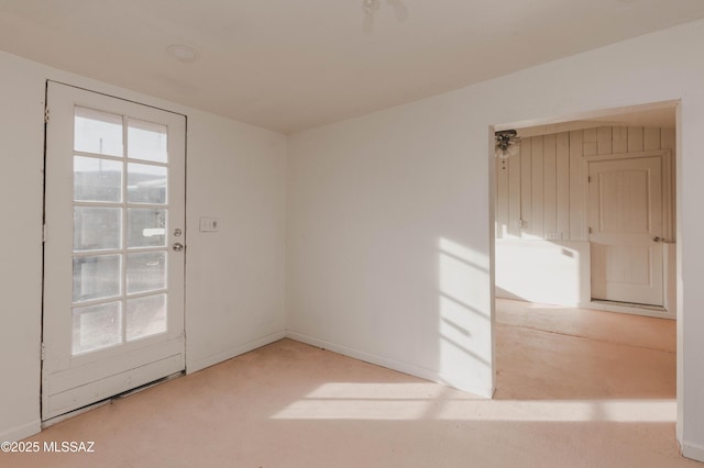 unfurnished room with carpet flooring