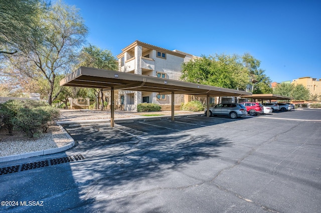 view of car parking featuring a carport