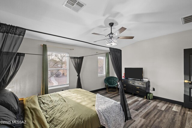 bedroom featuring wood-type flooring, a closet, and ceiling fan