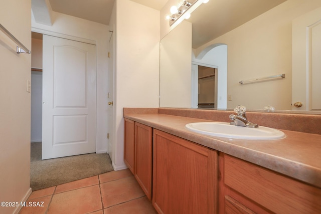 bathroom with vanity and tile patterned floors