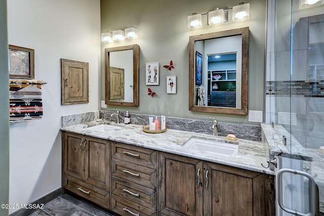 bathroom featuring vanity and an enclosed shower