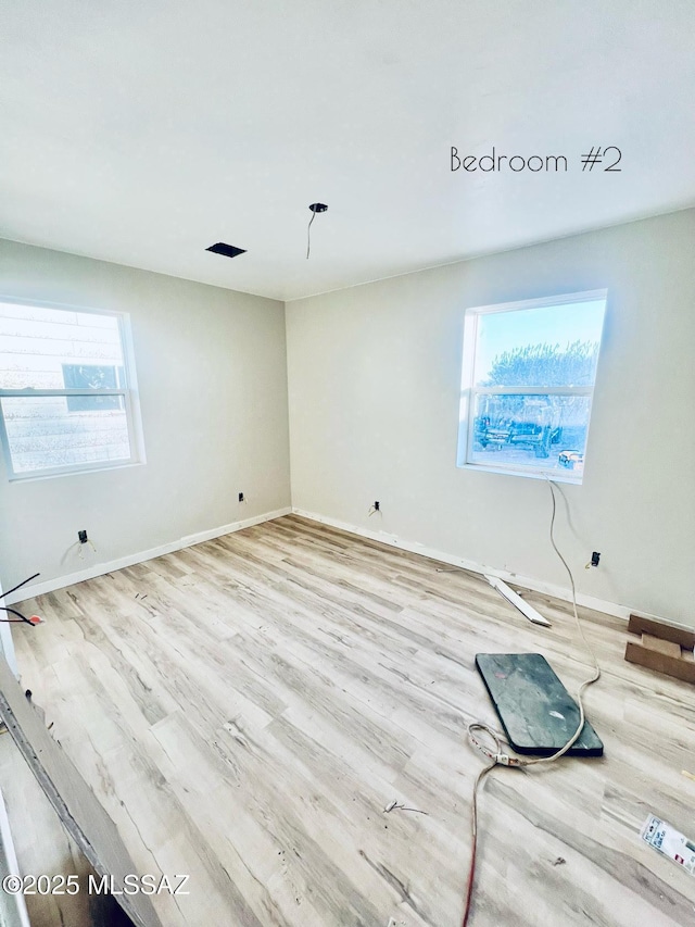 1105 S 1st Ave, Safford, AZ 85546 - empty room with hardwood / wood-style flooring