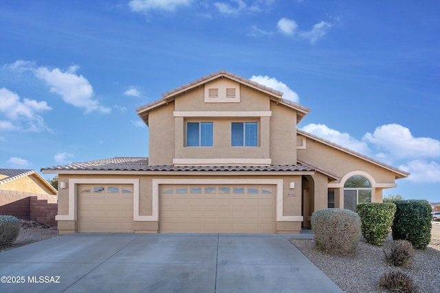 view of front of property featuring a garage